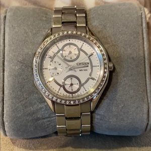 Solar powered citizen watch with rhinestones.